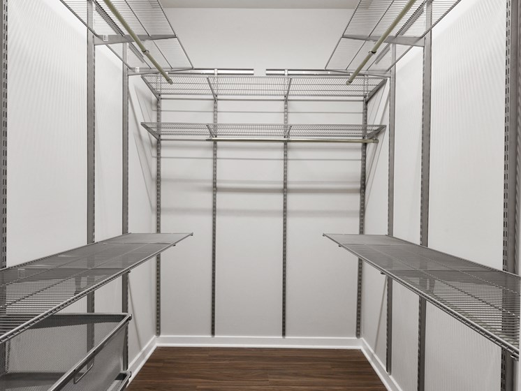 Huge walk-in closet with shelves and organizers in luxury apartment for rent in Wynnewood, PA